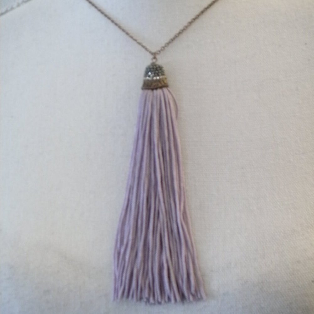 Pink Lemonade  Lavender Silk Tassel Long Necklace Held By A Jewel Gatherer